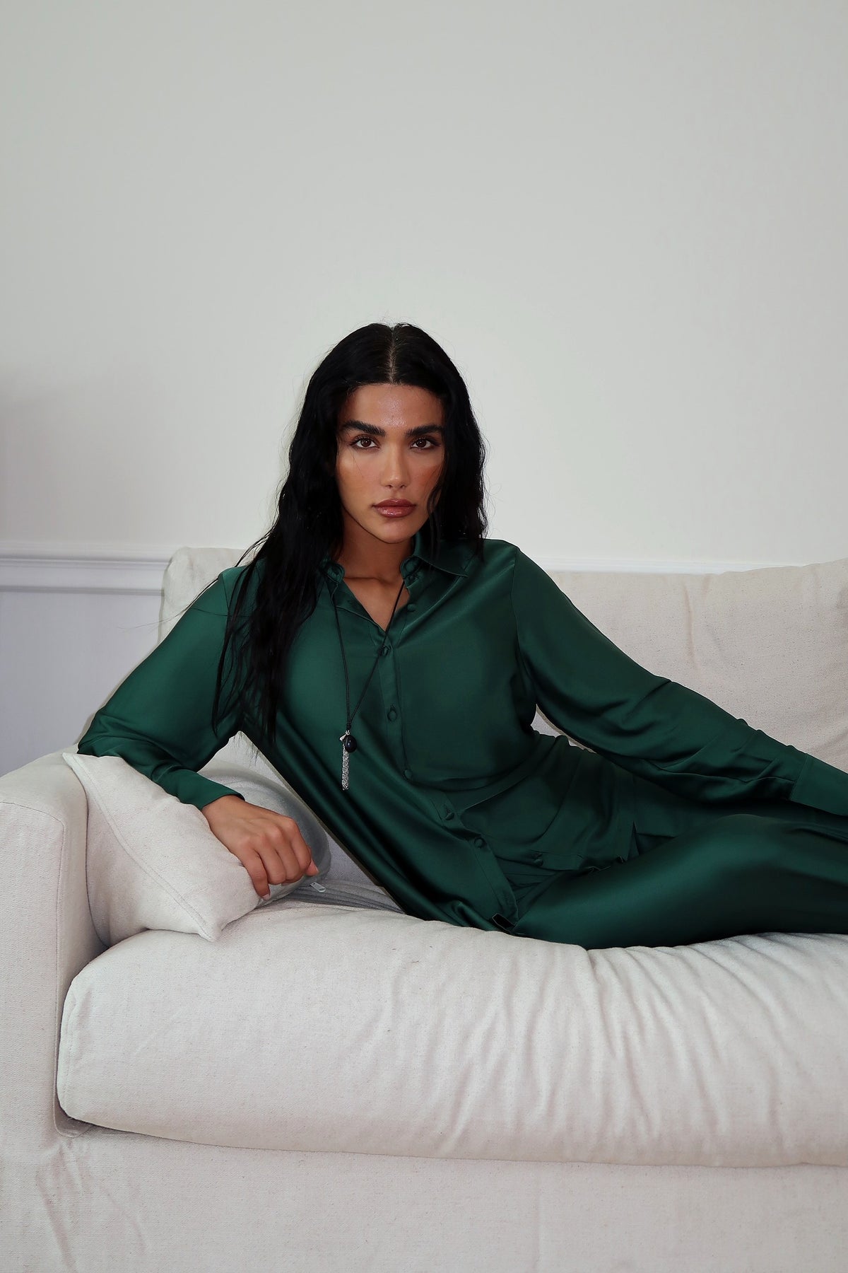 Emerald Green Fiora Set lounging on sofa