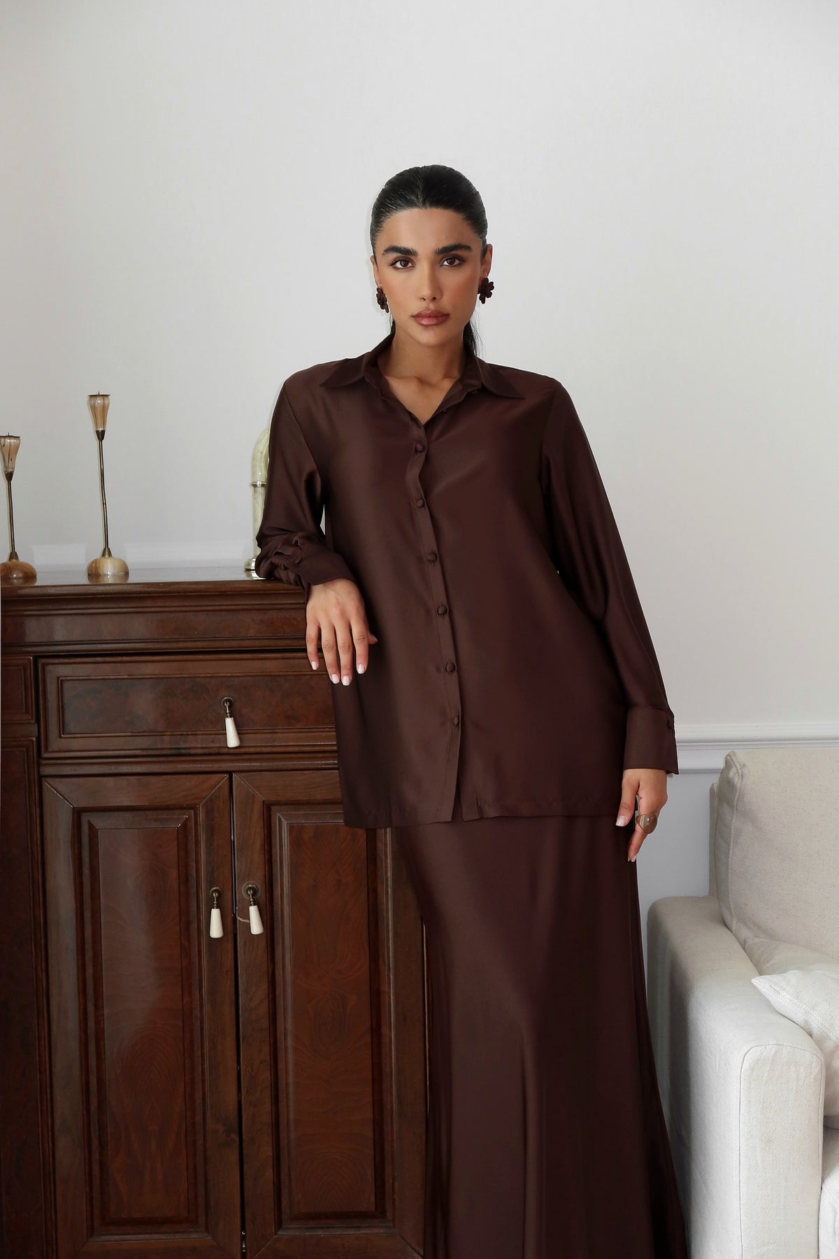 Espresso Fiora Skirt Set front, leaning on cabinet